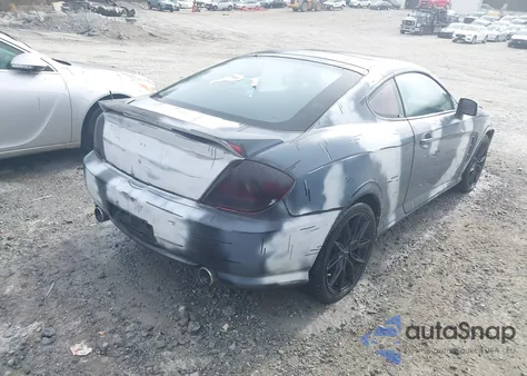 2005 Hyundai Tiburon Gt/Se z USA, uszkodzony, nr VIN KMHHN65F95U167571